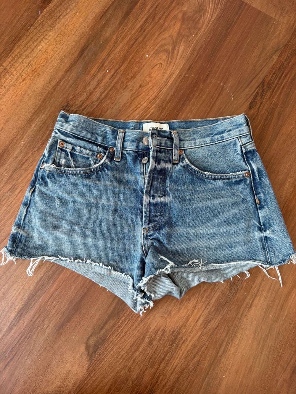 Agolde Distressed Light Blue Denim Cutoff Shorts